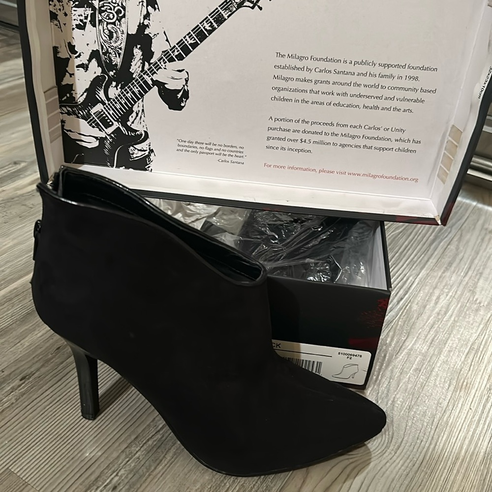 Black size 8 1/2 booties , carlos santana